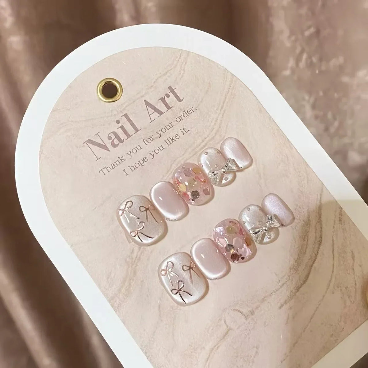 10pcs Short Handmade Nails with Sparkling Cat's Eye Hand-painted Bow in Nude Pink To Brighten Your Complexion Press-on Nail Tips